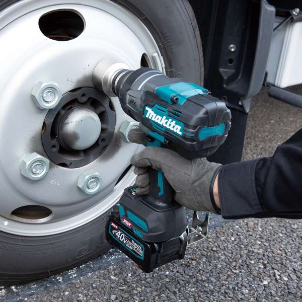 Makita TW001GZ 40V cordless impact wrench removing wheel nuts on site